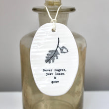 Load image into Gallery viewer, &#39;Never regret, just learn and grow&#39; Porcelain Tag Sign
